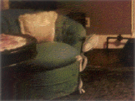 a blurry, low quality image of a small white humanoid figure peeking out from behind a couch
